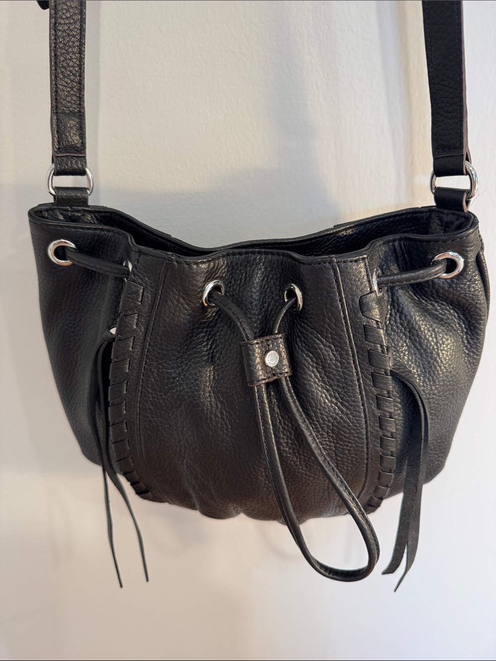 Aimee Kestenberg black leather drawstring crossbody bag